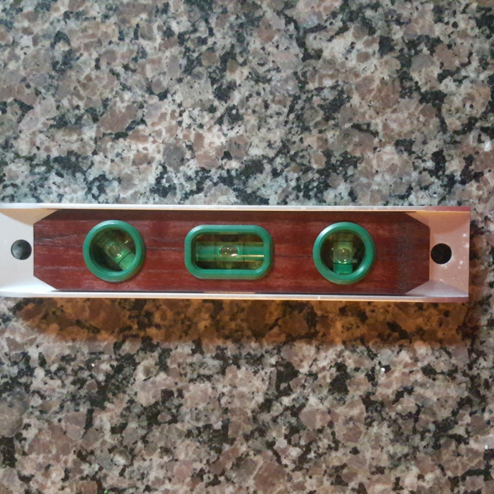 New brown wood torpedo level 9 in Menard's w/ tags 3 vials